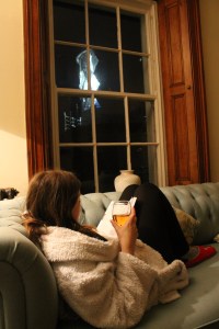 Reading a Lonely Planet guide with a view