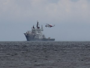The Pharos and Stornoway Coastguard helicopter